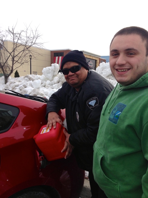 Orlando and Joe, my heroes, putting gas in my car on a freezing cold day. 